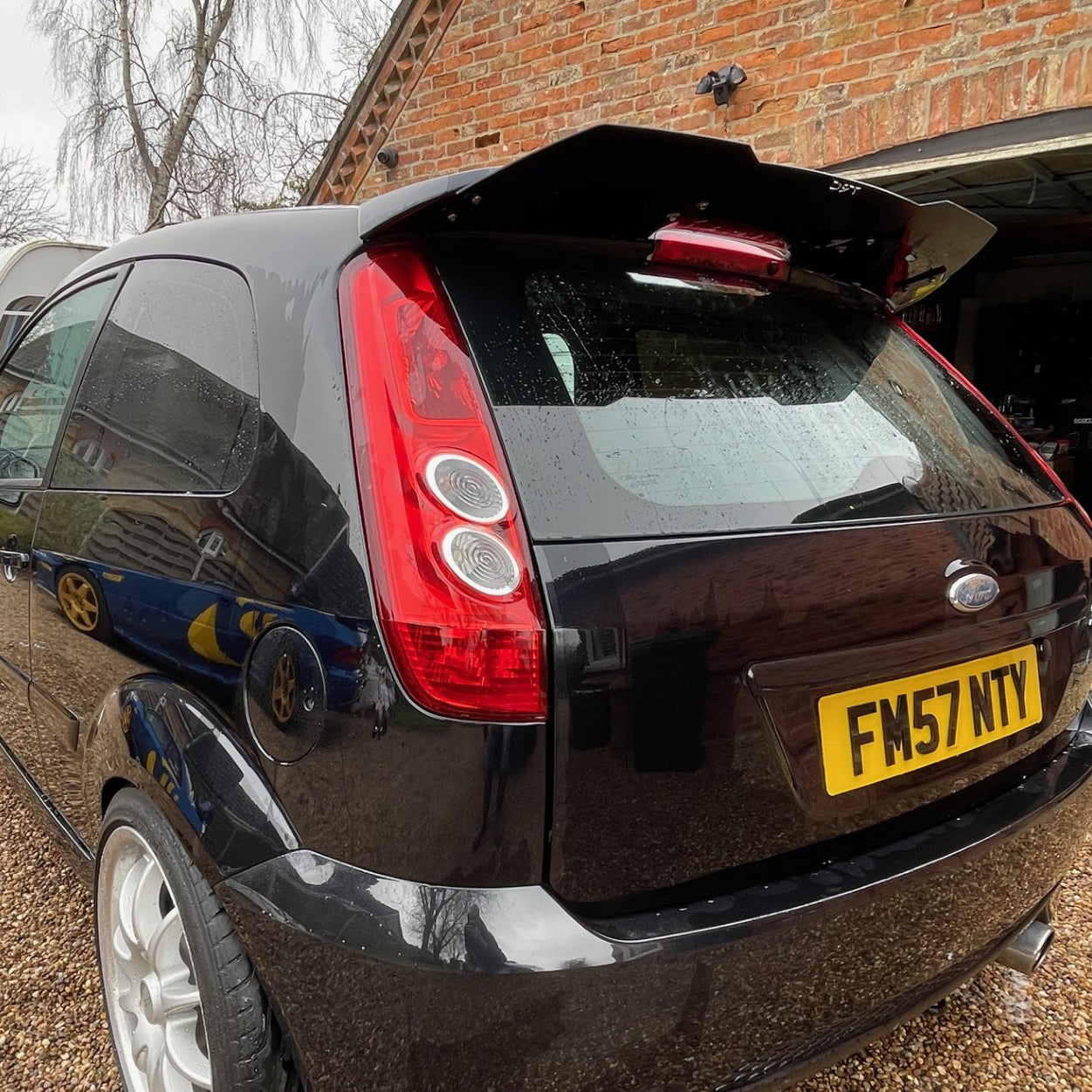 USED TRC spoiler extension. Black Aluminum CLEARANCE